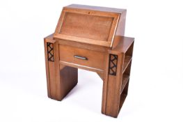 A small Art Deco period oak desk.