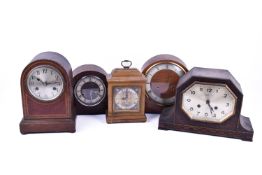 Five 20th Century mantel clocks including an oak art deco example.