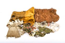 An assortment of vintage textiles and accessories.