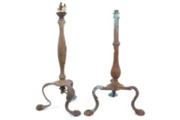 A matched pair of brass Faraday & Sons Pullman coach table lamps. Having a tripod base.