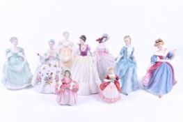 A collection of Doulton and Coalport 'lady' figures.
