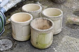 Four matching 20th century Cotswold studios Ltd deep weathered stone garden planters,