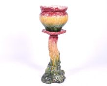 A Victorian pottery jardiniere and matching pedestal. Marked 'Princess' to base of the jardinere.