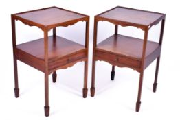 A pair of 20th century Georgian style mahogany nightstands.
