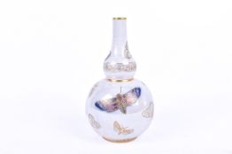 A Carlton lustre ware butterfly decorated double-gourd shaped vase. Unmarked.
