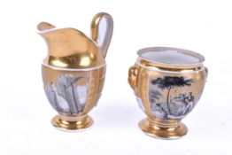 An early 19th Century porcelain transfer printed cream jug decorated with ladies against a gilt