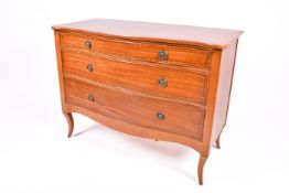 A 19th Century style serpentine commode chest of drawers.