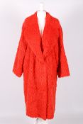 A vintage Swedish House of Saki Stand Studio orange faux fur coat.