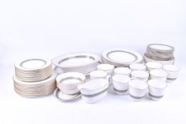 A Royal Doulton Rondelay H 5004 green and gilt dinner and tea service.