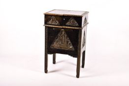 An early 20th century carved oak cabinet.