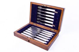 A mother of pearl cutlery set