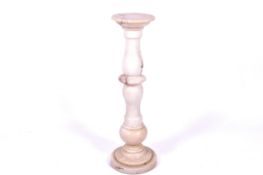 White marble baluster pedestal stand. Having a circular base and top.