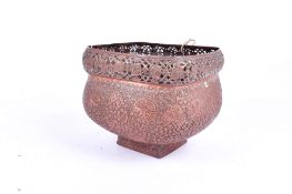 An Indian copper censor of rectangular form. Having floral decoration.