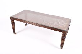 A 20th century French Louis XVI style cane top coffee table.