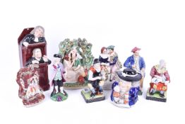 Seven Staffordshire pottery figures. Including Toby and Scottish figures, etc.