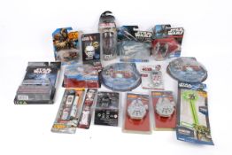 A group of assorted Star Wars related collectables.