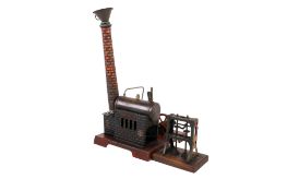 A tin model of a German steam engine early 1900's, possibly by Marklin Bing,