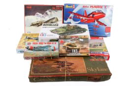 A collection of assorted plastic model maker's kits, mostly aircraft, all boxed.