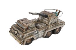 A circa 1960's Japanese Sankei 'Mighty Half-Truck' tin plate friction toy.