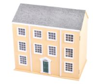 A modern Georgian style dolls house and furniture.