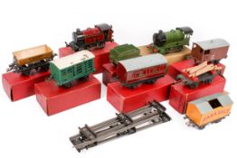 A collection of vintage Hornby clockwork tin plate O gauge model railway items.