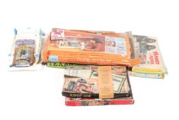 A collection of assorted modern toys and vintage board games.