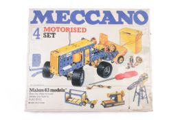 A box of Meccano, no. 4 Motorised set. Not checked for completeness, witj instruction booklets.