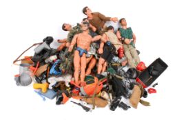 An assortment of Action Man figures and accessories.