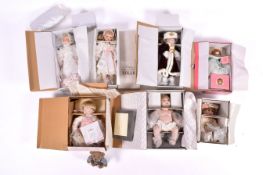 A quantity of assorted collector's dolls and a teddy bear.