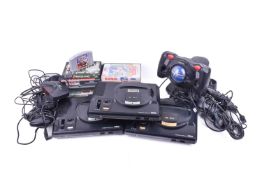 A collection of vintage Sega Mega Drive items.