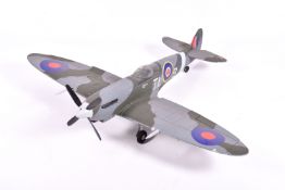 A polystyrene radio control model plane modelled as a Supermarine Spitfire with camouflage and