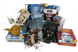 A collection of circa 1990s Star Wars action figures and vehicles, etc.