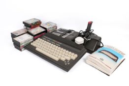 Commodore plus/4 personal home computer video games console with games and accessories.