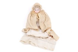 An antique Ernst Huebach bisque head doll.