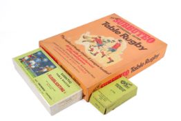 Three vintage Subbuteo games and accessories. Comprising a set of Table Soccer Floodlights, a C.