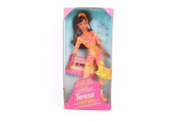 A Mattel Barbie Teresa Aerobic Workin' Out doll with original tape cassette, boxed.