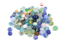 A collection of assorted vintage glass marbles.