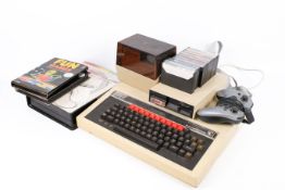 An Acorn BBC 'B' personal home 32K computer, games and accessories, etc.