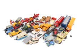 A collection of assorted play worn diecast model vehicles. Including Corgi and Dinky, etc.