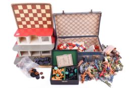 A collection of assorted vintage play worn toys.