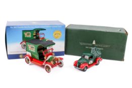 Two Franklyn Mint precision diecast models vehicles, Christmas related, both boxed.