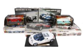Eight large scale diecast cars. Comprising a boxed Bburago 1:24 scale No.