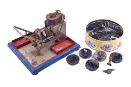 A vintage lead soldier making casting press machine with dies.