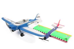 A group of two assorted RC model aircraft.