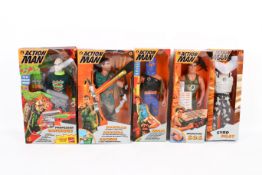 A collection of five assorted Hasbro Action Man figures, boxed.