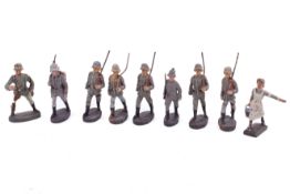 A small group of circa 1930s German Lineol Elastolin composition toy soldiers. Including a nurse.