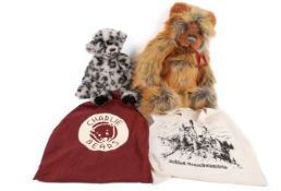 Two Charlie Bears bears.