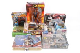 A group of assorted mostly Star Wars and other modern collectables, all boxed.