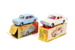 Two vintage Dinky Toys diecast model cars, boxed.