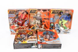 A collection of assorted Hasbro Action Man figures, boxed.